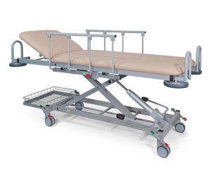 K. H. Dewert Transport- und Aufwachliege DX1 – Modell 1090H mit kurzem Kopfteil (Anwendungsbeispiel mit optionalem Ablagekorb)