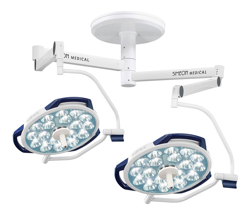 SIMEON Sim.LED 500 / 500 OP-Doppel-Leuchte, SingleColor (SC) mit Standard Tragarmsystem (Abb. zeigt Ausführung mit Handgriffen) SIMEON Sim.LED 500 / 500 OP-Doppel-Leuchte, SingleColor (SC) mit Standard Tragarmsystem (Abb. zeigt Ausführung mit Handgriffen)
